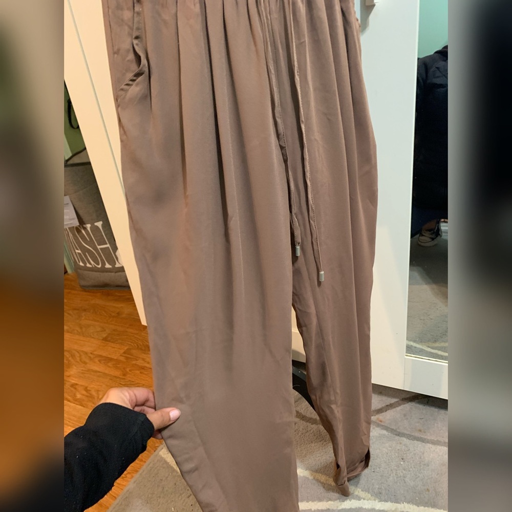 Tan polyester pants. - Picture 2 of 3